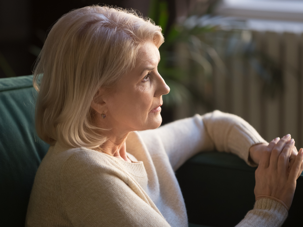 Surviving Spouse looks outside