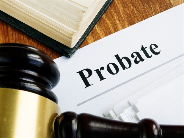 probate document next to gavel and law book