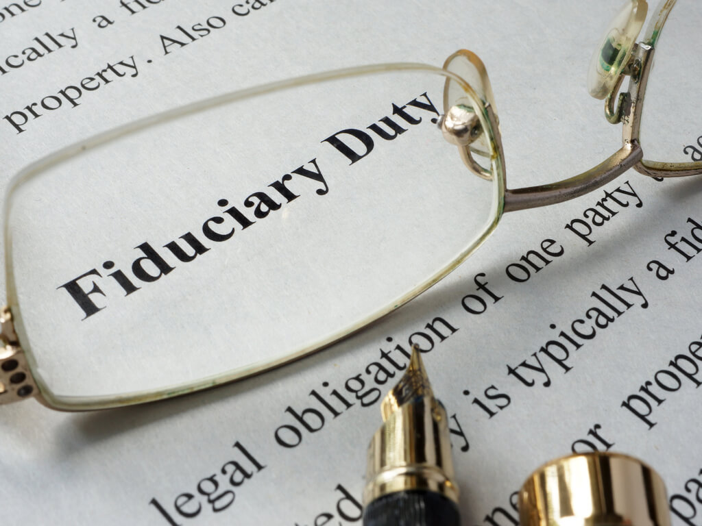 fiduciary duty document with glasses