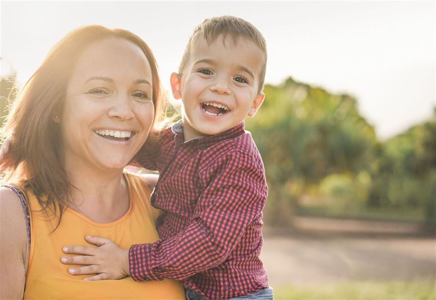 Mom after figuring out a parenting plan with child visitation lawyer