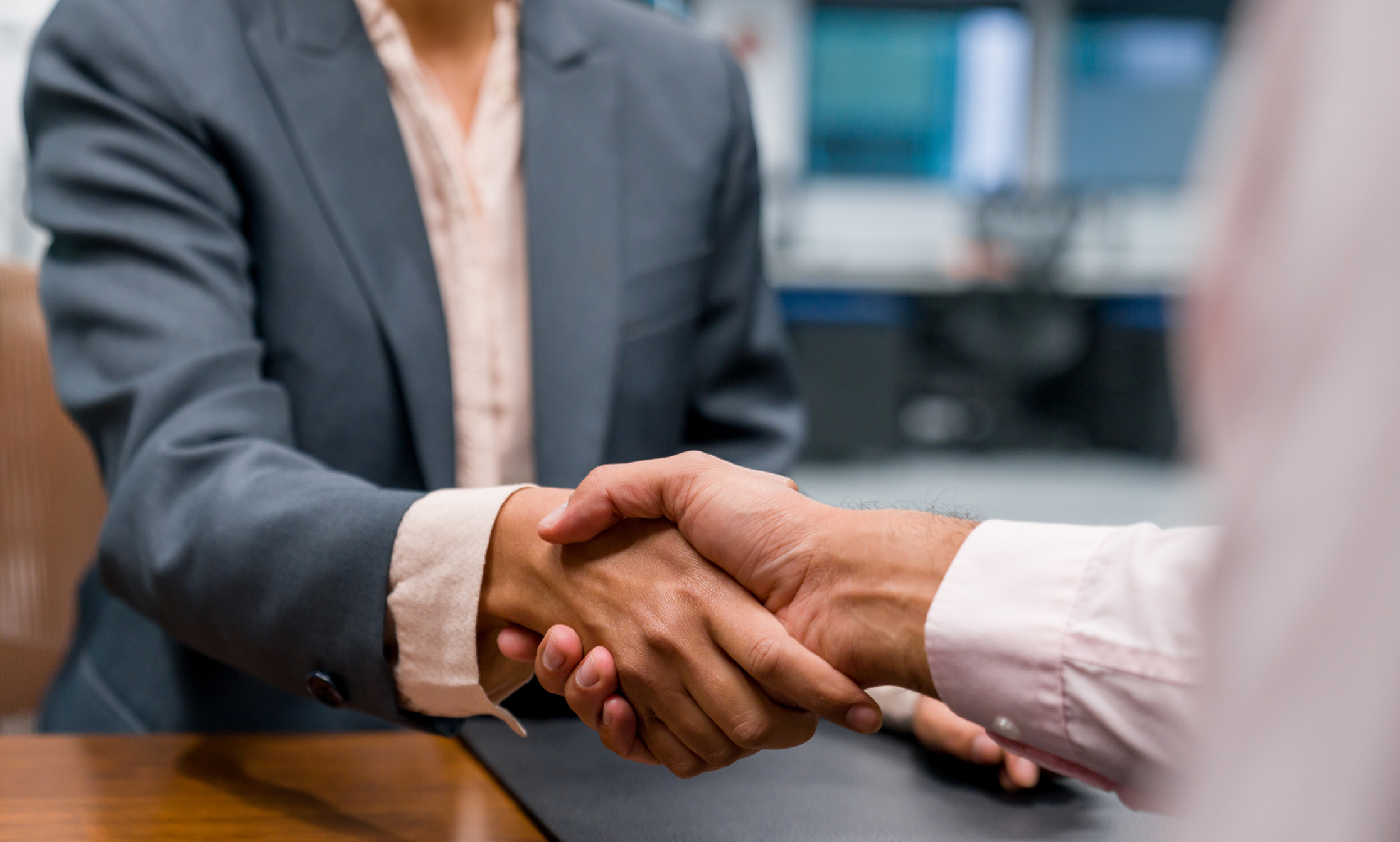 Shaking hands with irrevocable trust attorney