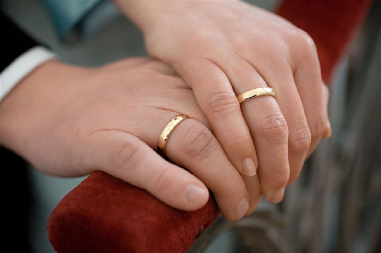 Married couple after meeting with prenuptial agreement attorney