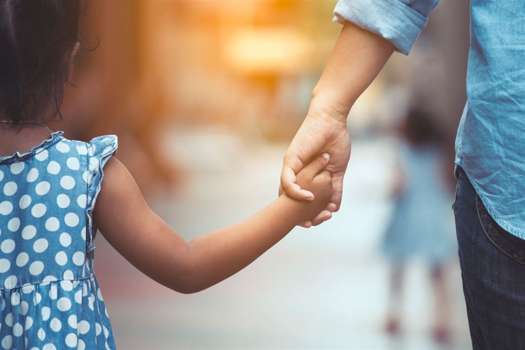 Tennessee family holding hands after making a living will